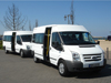14-Sitzer Ford Transit side view with sliding door